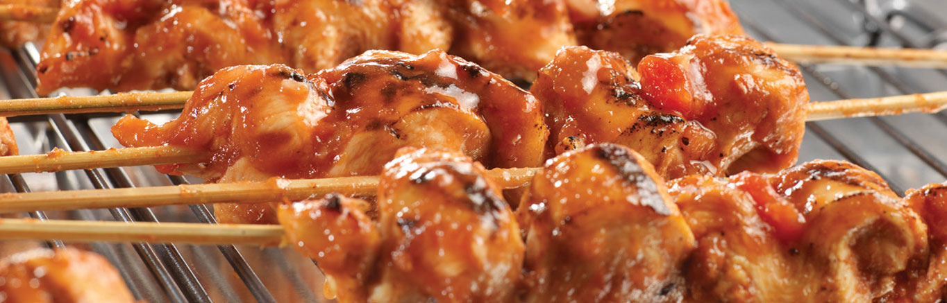 An image of prepared Garlic & Lime Grilled Chicken Skewers made with chicken, Pace® Picante Sauce, garlic and cumin.