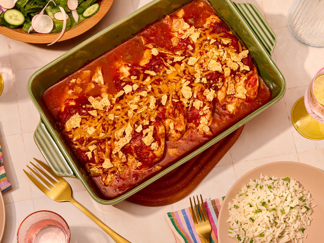 An image of prepared Baked Picante Chicken made with chicken, Pace® Picante Sauce, tortilla chips and Cheddar cheese.