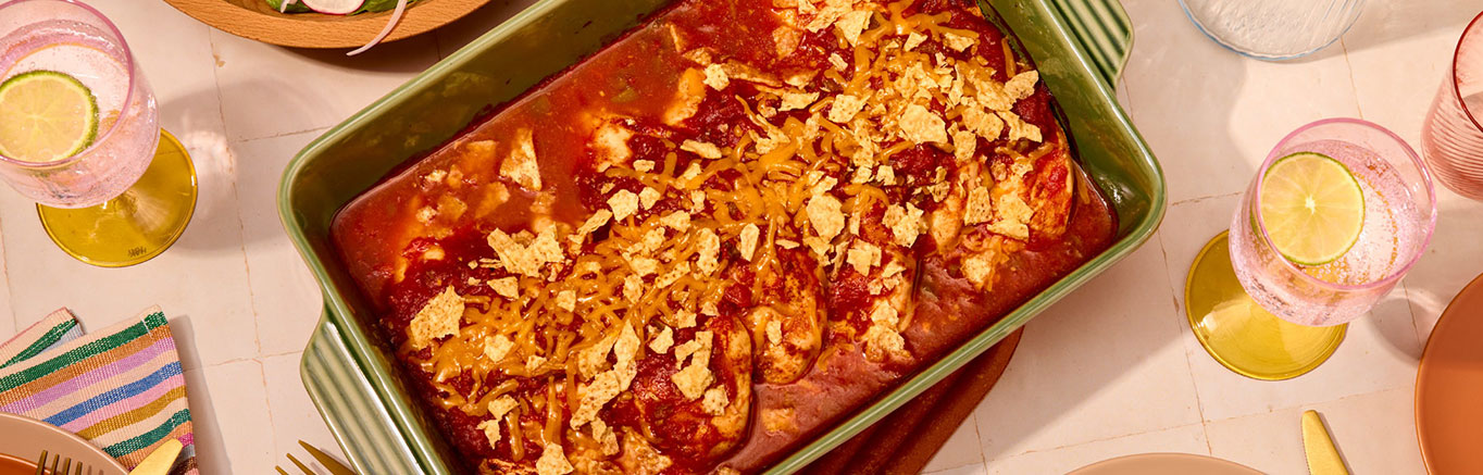 An image of prepared Baked Picante Chicken made with chicken, Pace® Picante Sauce, tortilla chips and Cheddar cheese.