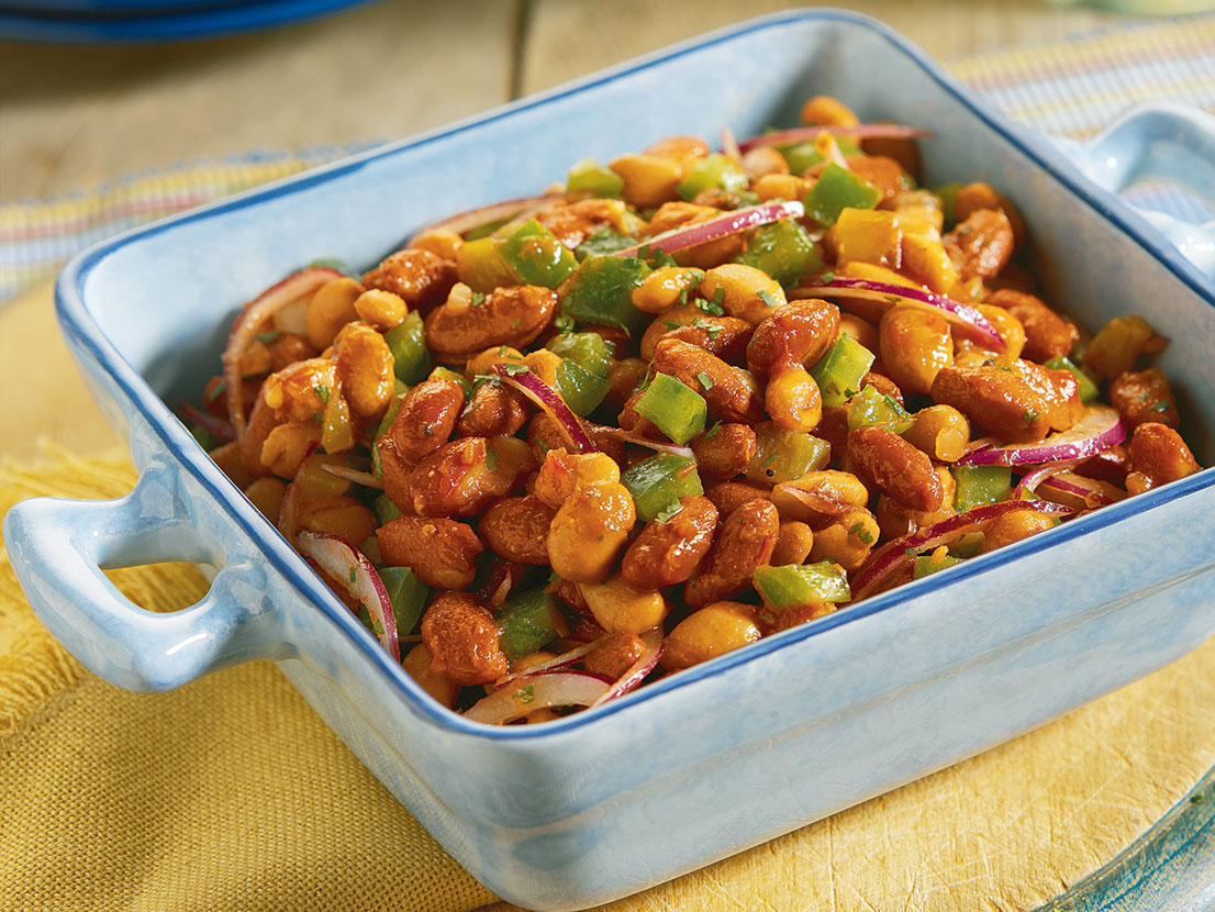 An image of prepared Best-of-the-West Bean Salad made with Pace® Picante Sauce, cilantro, lime, green bell pepper, red onion, kidney beans and pinto beans.
