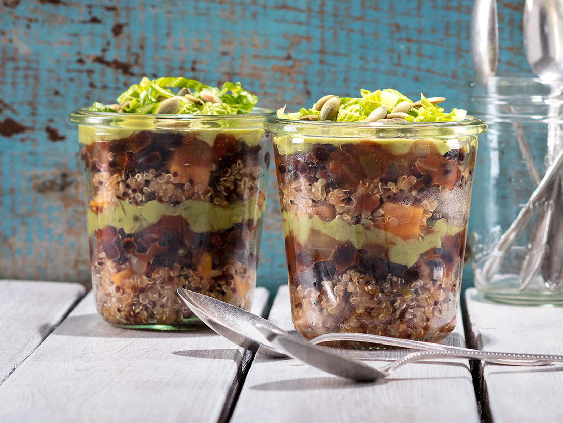 An image of prepared Buddha Bowls made with sweet potatoes, quinoa, Pace® Chunky Salsa, black beans and guacamole.