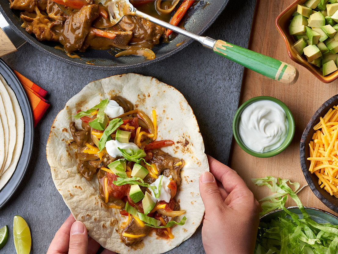 Image of prepared Cheesy Garlic Steak Fajitas recipe made with Pace® salsa