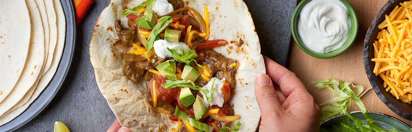 Image of prepared Cheesy Garlic Steak Fajitas recipe made with Pace® salsa
