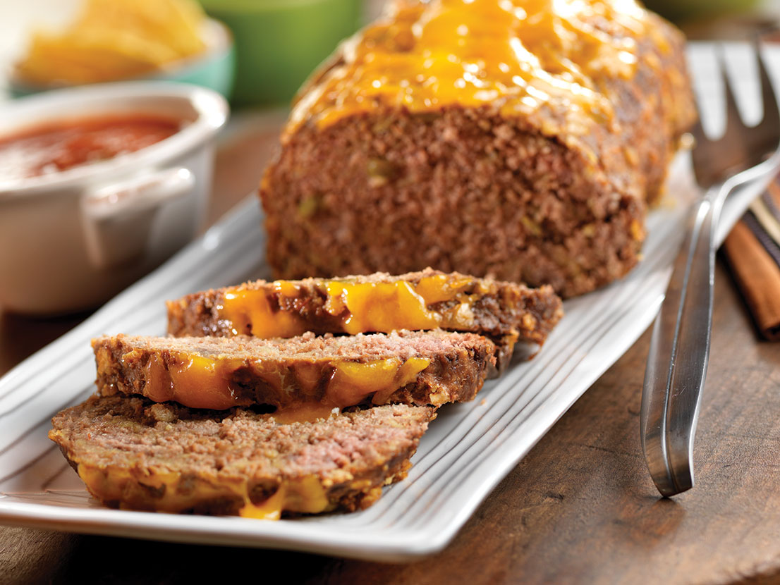 An image of prepared Image of prepared Cheesy Taco Meatloaf recipe made with Pace® Chunky Salsa, ground beef, tortilla chips and Cheddar cheese.