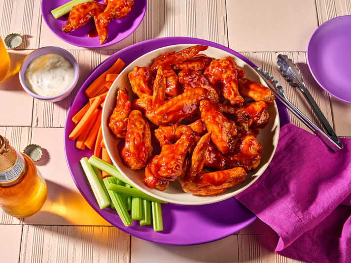 An image of Hot Honey Chipotle Air Fryer Wings made with chicken wings and Pace® Signature Sauces Hot Honey Chipotle Sauce.