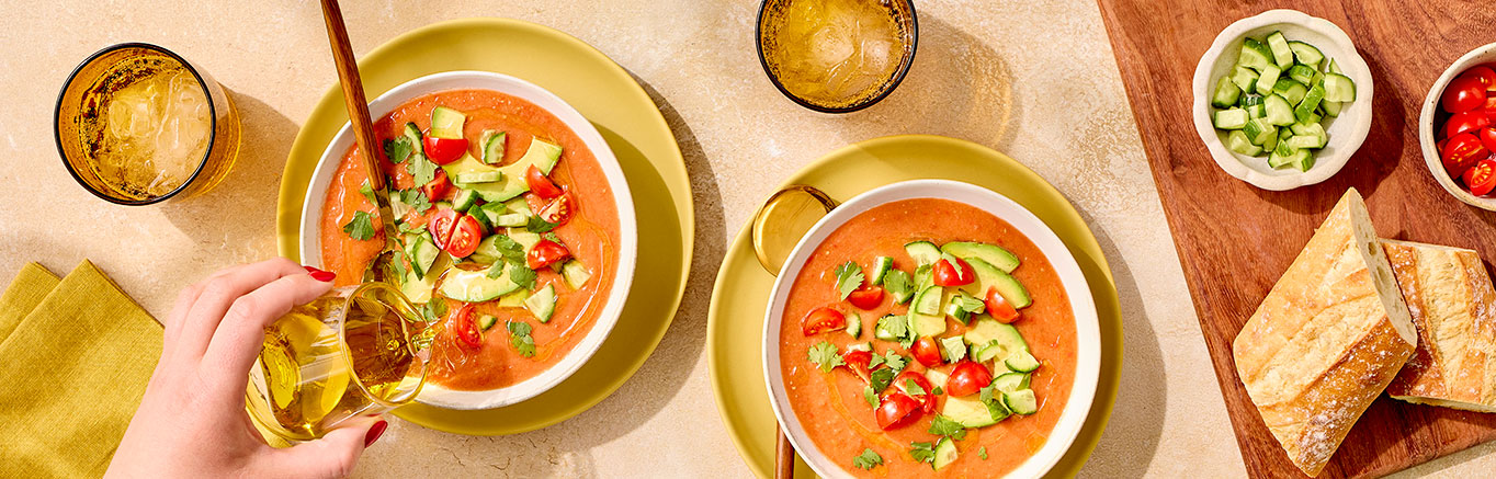 An image of prepared Mexican-Style Gazpacho made with tomatoes, cucumber, Pace® Picante Sauce, Pace® Signature Sauces Hot Honey Chipotle Sauce and avocado.