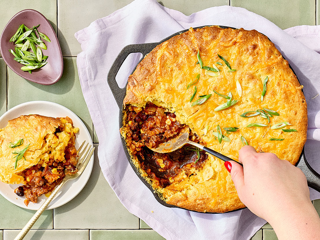 An image of prepared Tamale Skillet Pie made with Pace® Picante Sauce, Pace® Classic Taco Signature Sauce, ground beef, onion, corn and corn muffin mix.