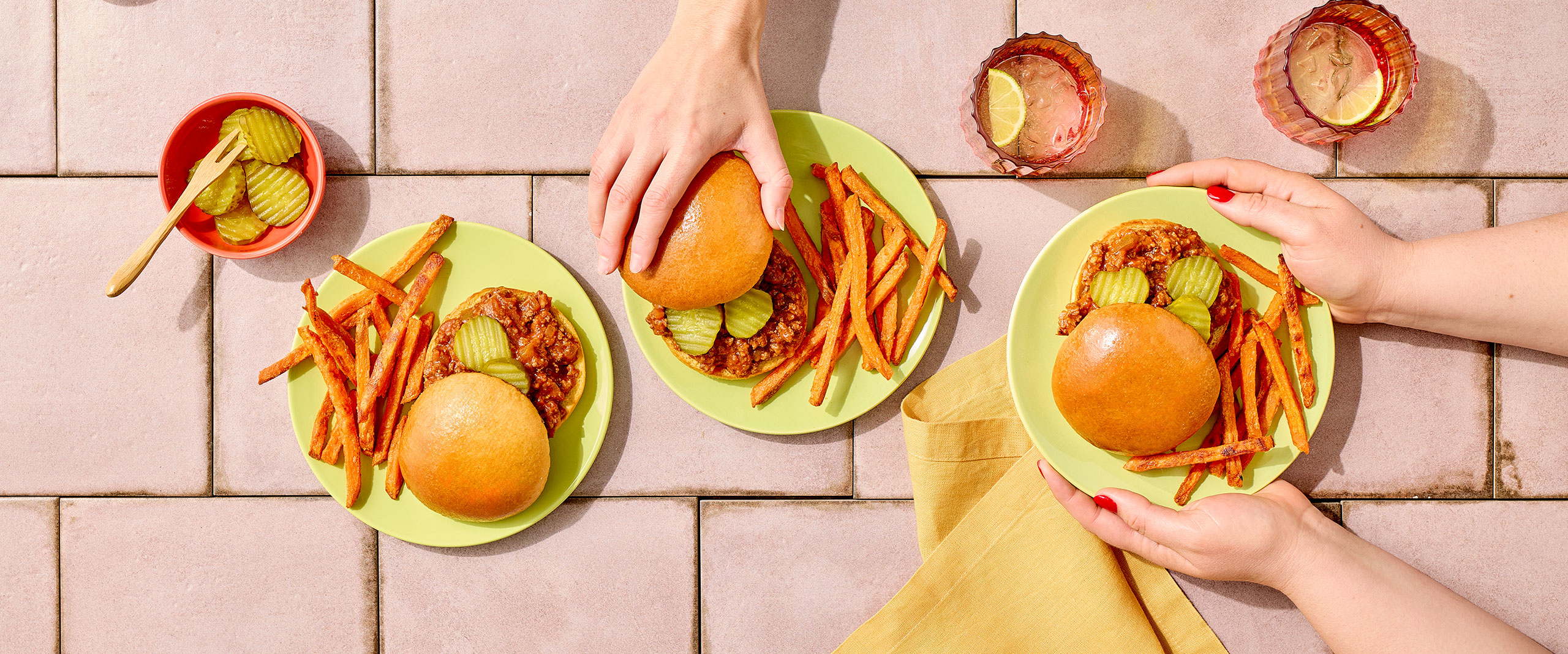 An image of prepared Mexican Sloppy Joes made with ground beef, Pace® Picante Sauce, Pace® Signature Sauces Classic Taco Sauce, ketchup and Pepperidge Farm® Brioche Hamburger Buns.