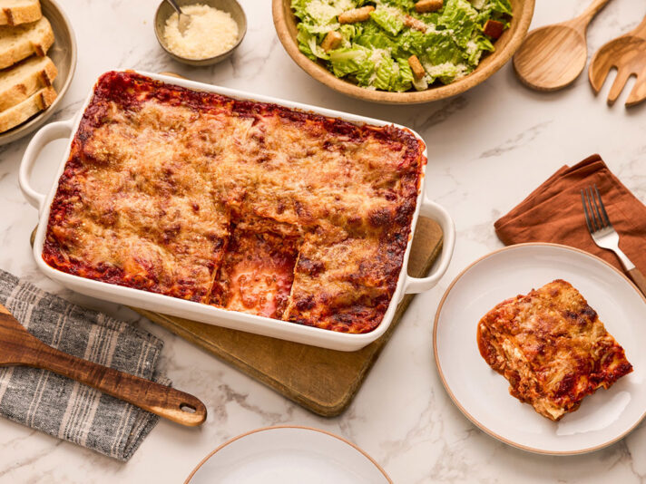 Image of prepared Classic Lasagna made with ricotta cheese, Parmesan cheese, ground beef, Prego® Traditional Italian Sauce, lasagna noodles and mozzarella cheese.