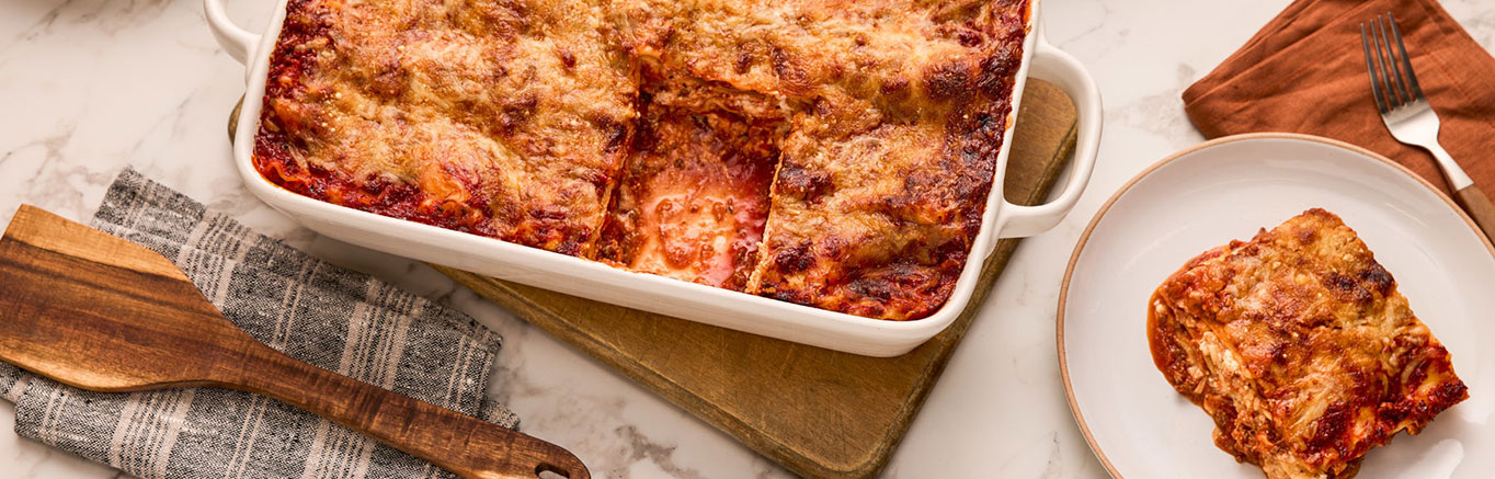 Image of prepared Classic Lasagna made with ricotta cheese, Parmesan cheese, ground beef, Prego® Traditional Italian Sauce, lasagna noodles and mozzarella cheese.