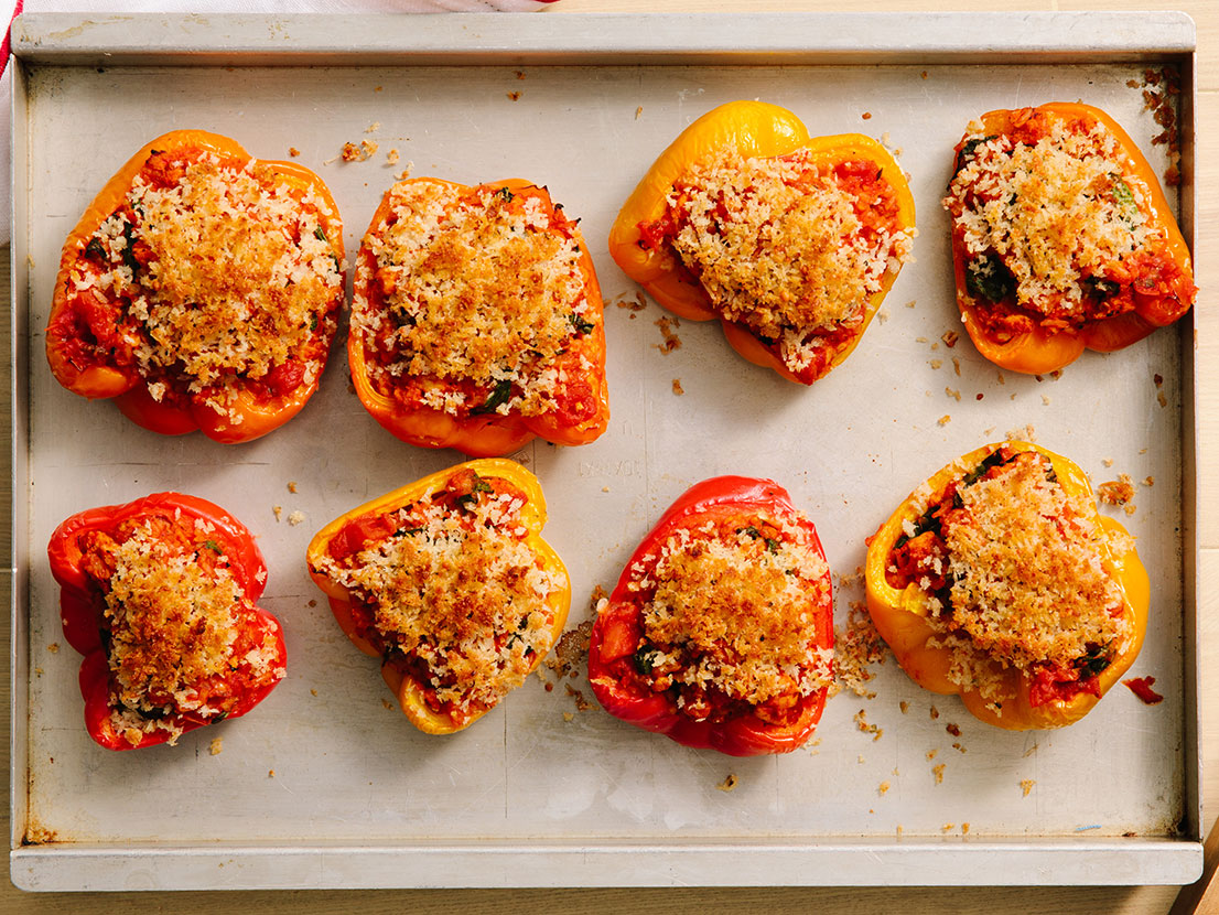 An image of prepared Hearty Italian Stuffed Peppers made with bell peppers, ground turkey, onion, Prego® Traditional Italian Sauce, baby spinach and white rice.