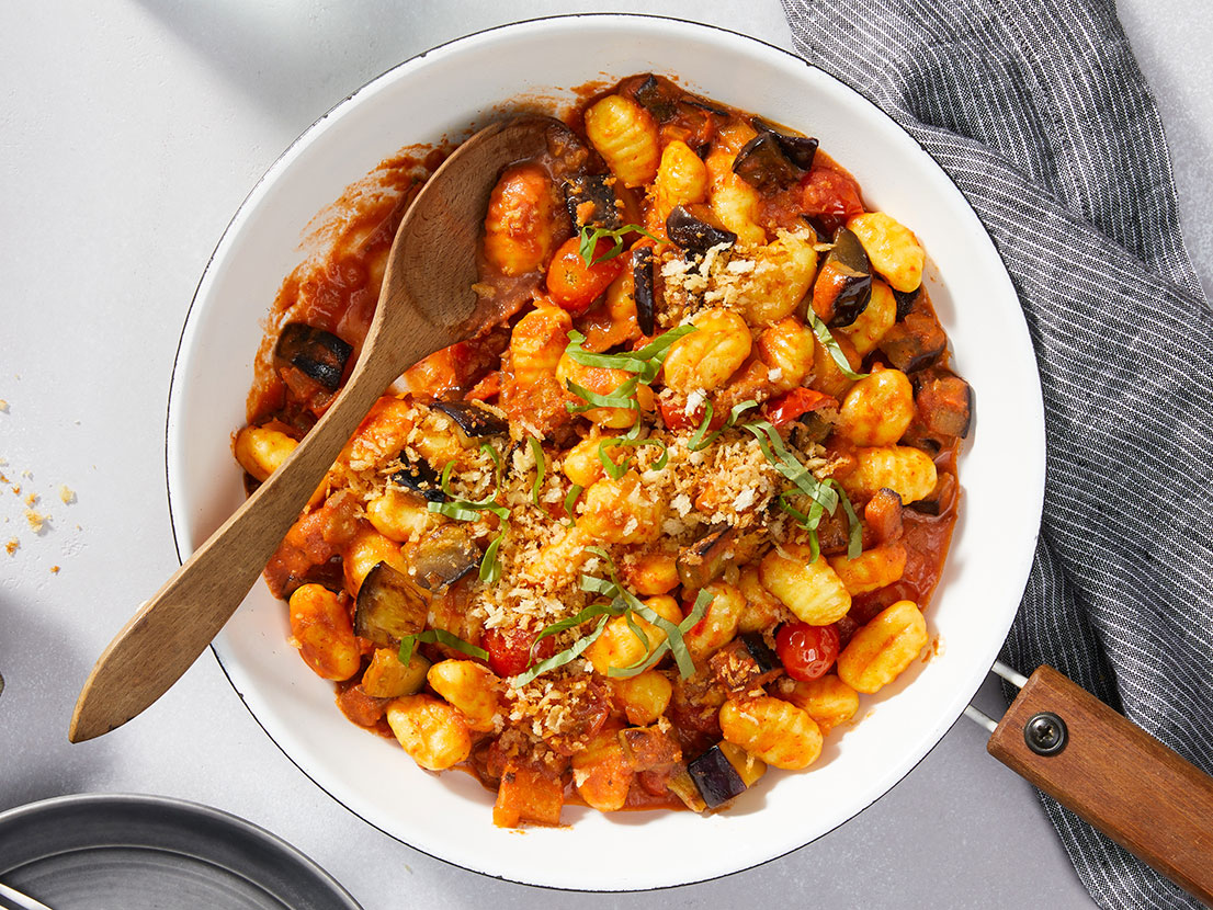 An image of prepared Creamy Tomato Gnocchi with Eggplant made with Prego® Creamy Tomato with Ricotta Sauce, Parmesan cheese, eggplant, onion, cherry tomatoes, garlic and potato gnocchi.