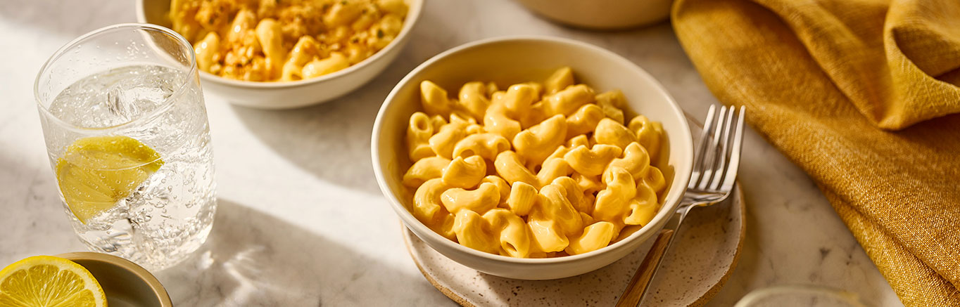An image of prepared 2-Ingredient Weeknight Mac & Cheese made with elbow macaroni pasta and Prego® Creamy Cheddar Cheese Sauce.