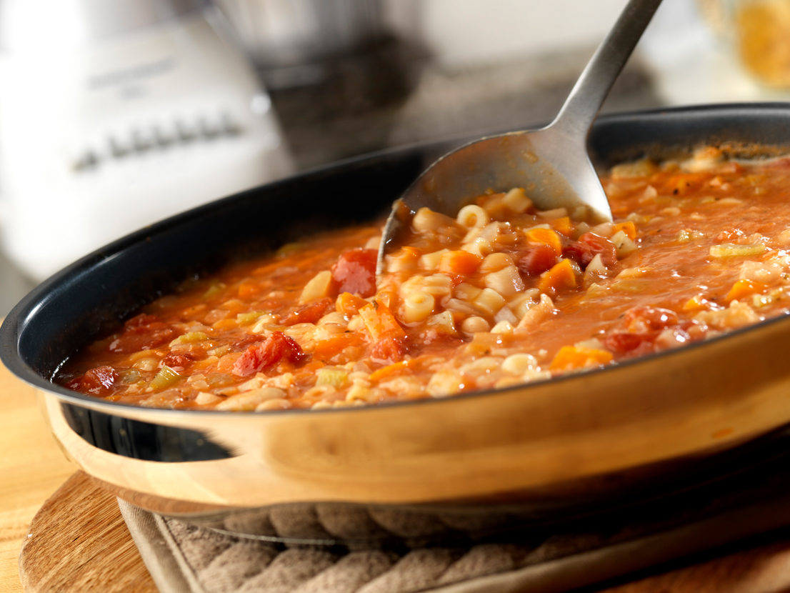 An image of prepared Pasta e Fagioli made with Swanson® Chicken Broth, canned tomatoes, ditalini and cannellini beans.