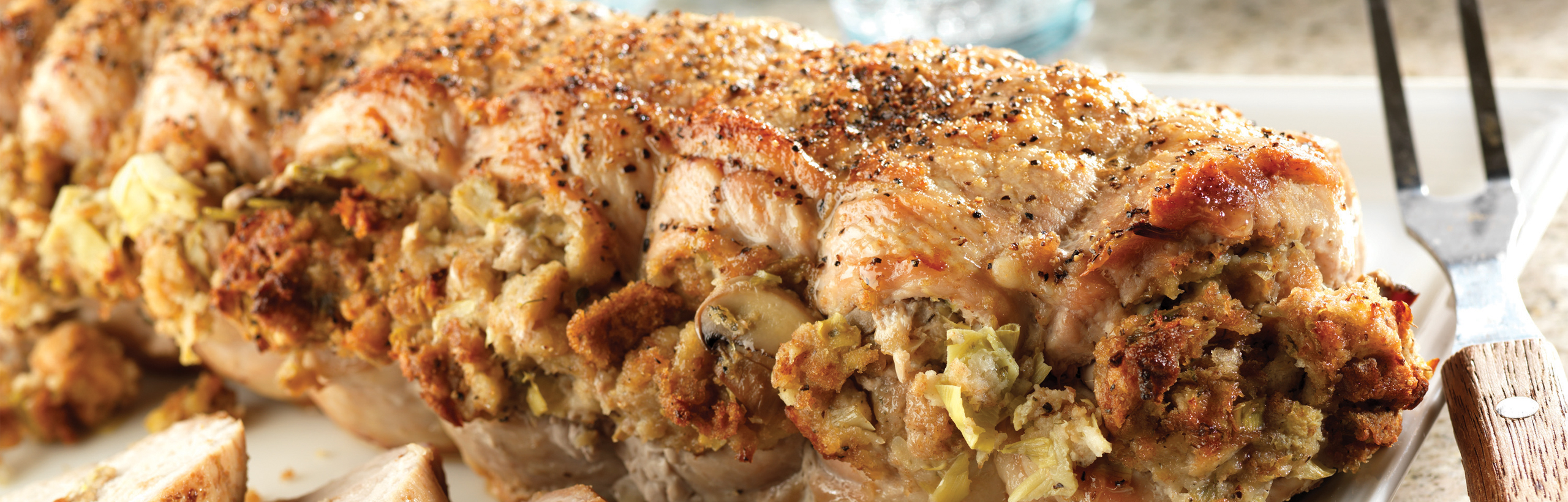 Image of the prepared Stuffed Pork Roast with Herb Seasoned Artichoke & Mushroom Stuffing recipe