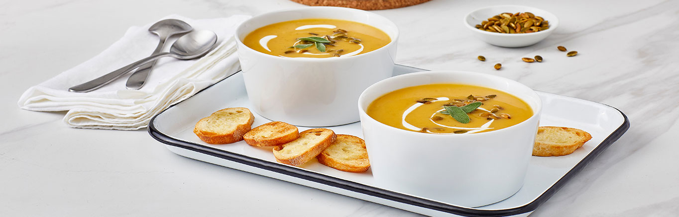An image of prepared Butternut Squash Soup with Sage made with butternut squash, Granny Smith, onion, sage and Swanson® Chicken Broth.