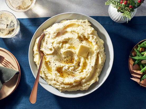 Image of prepared Ultra Creamy Mashed Potatoes made with Swanson® Chicken Broth, Yukon Gold potatoes, light cream and butter.