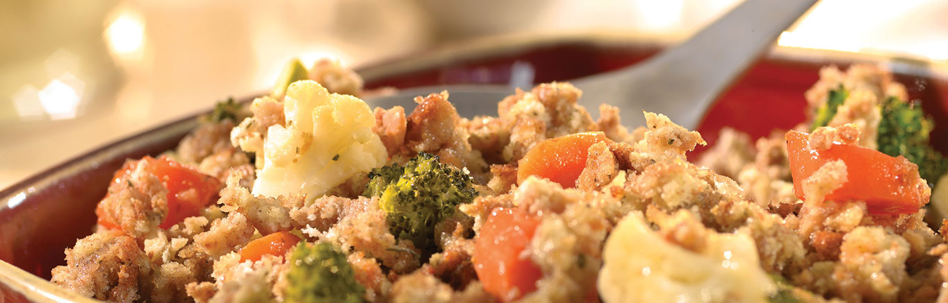 An image of prepared Garden Vegetable Stuffing made with Swanson® Chicken Broth, California vegetable blend and Pepperidge Farm® Seasoned Stuffing.
