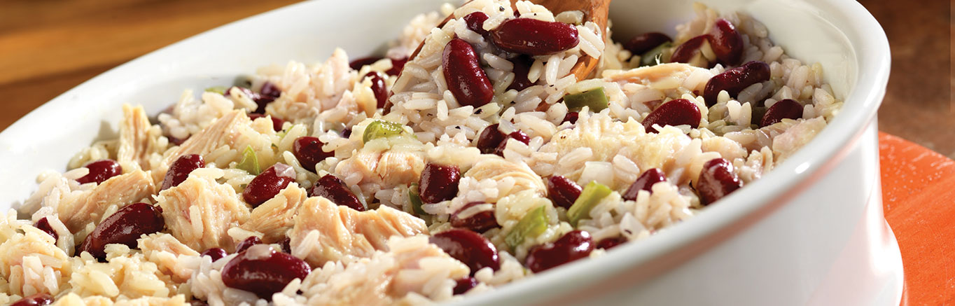 An image of prepared Mexican Chicken & Rice made with Swanson® Chicken Broth or Stock, onion, pepper, long grain white rice, kidney beans and Swanson® Premium White Chunk Chicken.