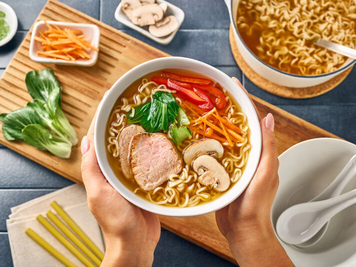 An image of prepared Easy 2-Step Classic Ramen made with Swanson® Ramen Chicken Broth and ramen noodles.