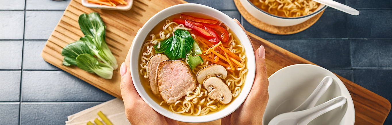 An image of prepared Easy 2-Step Classic Ramen made with Swanson® Ramen Chicken Broth and ramen noodles.