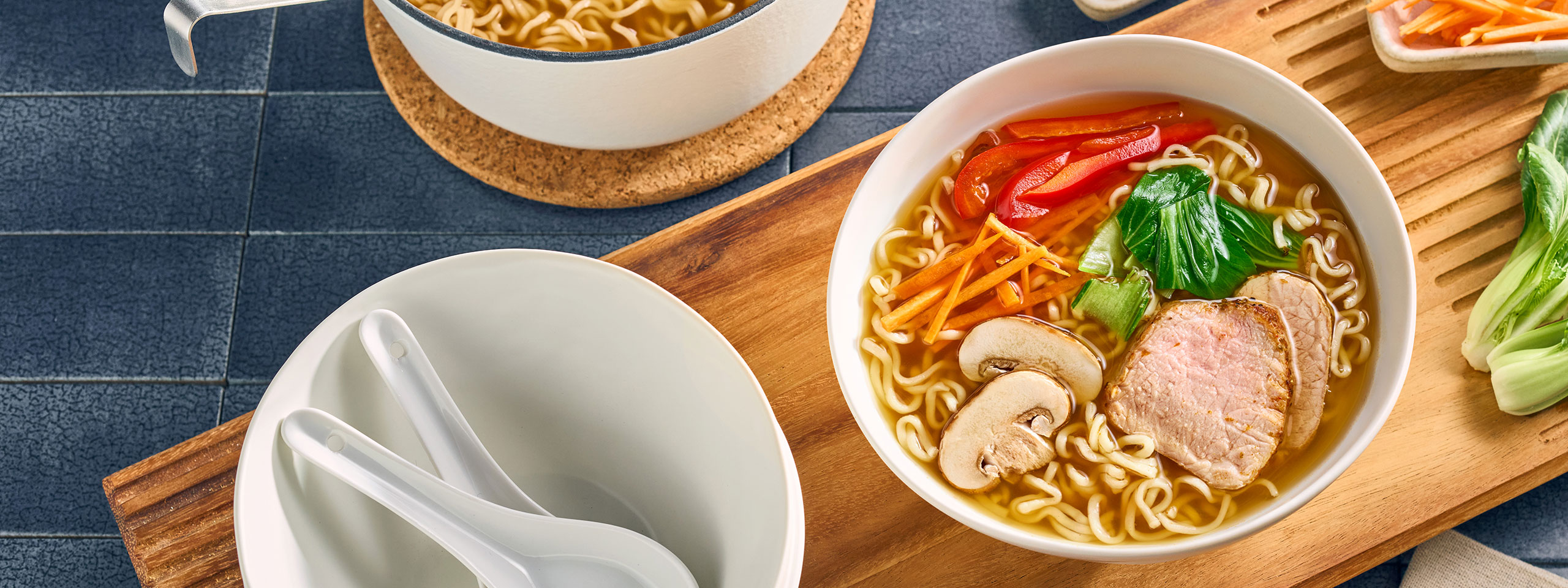 An image of prepared Easy 2-Step Classic Ramen made with Swanson® Ramen Chicken Broth and ramen noodles.