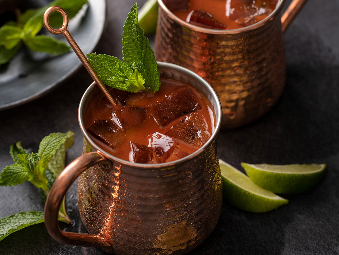 An image of prepared Moscow Mule Mary made with V8® 100% Vegetable Juice, ginger vodka, ginger beer and lime juice.