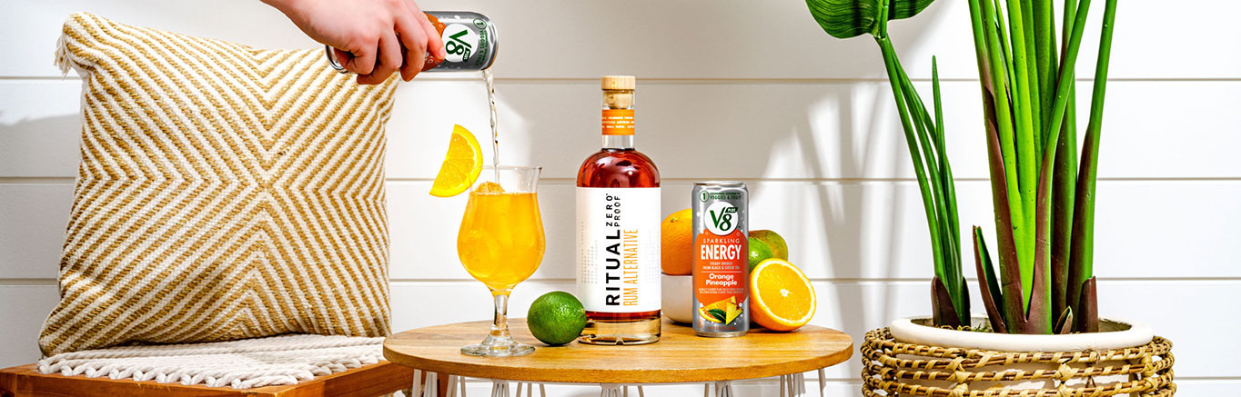 An image of prepared Non-Alc Nada Colada made with Ritual Zero Proof Rum Alternative, coconut water, lime juice and V8 Energy® Sparkling Orange Pineapple.