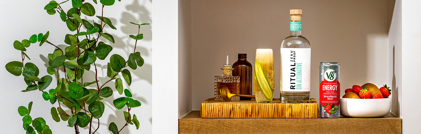 An image of prepared Non-Alc Strawberry Kiwi Cooler made with cucumber, Ritual Zero Proof Gin Alternative, lime juice and V8 Energy® Sparkling Strawberry Kiwi.