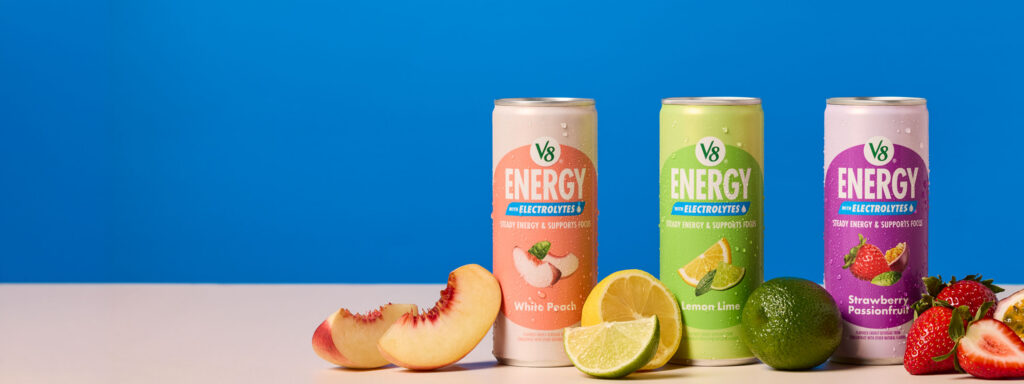 Hero image featuring V8® Energy with Electrolytes beverages in can and drink mix packet formats, highlighting steady energy, electrolytes, and refreshing fruit-forward flavors.