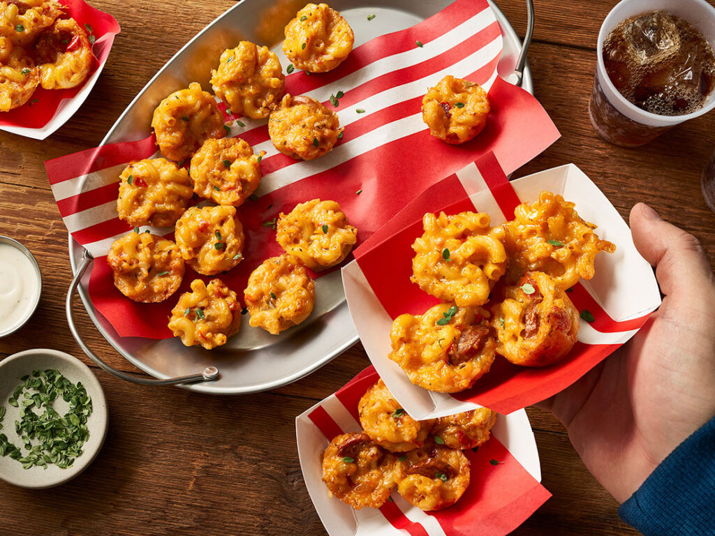 An image of prepared Cajun Mac & Cheese Bites showing elbow macaroni with Campbell's® Chunky® Chicken and Sausage Gumbo, Cheddar cheese and panko.