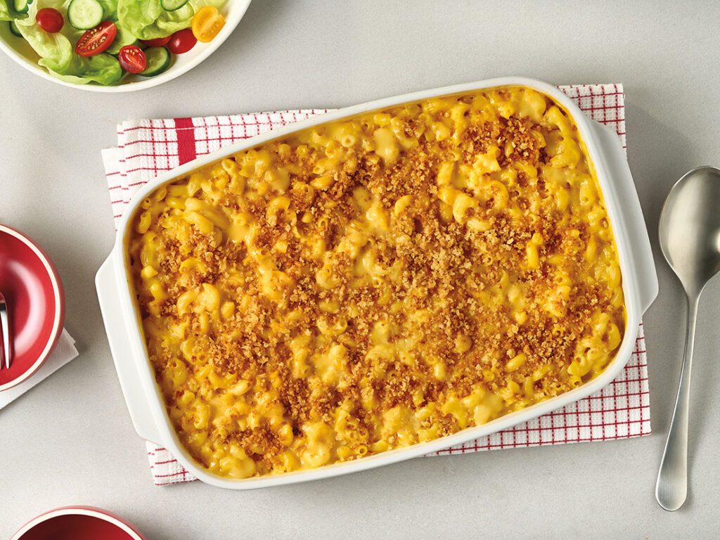 An image of prepared No-Boil Cheddar Mac & Cheese made with Campbell's® Condensed Cheddar Cheese Soup, milk, elbow macaroni, Cheddar cheese, black pepper, panko and butter.